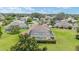 Expansive screened-in pool and spa area of a well maintained home with manicured lawn at 3319 Barrington Ct, The Villages, FL 32162