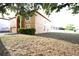 Charming two-story home with attached garage and well-maintained landscaping in a suburban neighborhood at 3329 White Blossom Ln, Clermont, FL 34711