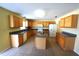 Spacious kitchen with granite countertops, an island, and modern appliances at 3329 White Blossom Ln, Clermont, FL 34711