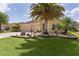 Well-maintained home featuring lush landscaping and inviting curb appeal at 3433 Nestlebranch Ave, The Villages, FL 32163