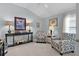 Inviting sitting room with decorative chairs and stylish décor at 3433 Nestlebranch Ave, The Villages, FL 32163