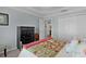 Comfortable bedroom with carpet flooring and ample closet space at 3433 Nestlebranch Ave, The Villages, FL 32163