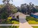 Charming single-story home with a well-manicured lawn and inviting curb appeal at 35107 Sweet Leaf Ln, Leesburg, FL 34788