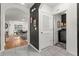 Hallway leading to laundry room, dining area, and living space at 35107 Sweet Leaf Ln, Leesburg, FL 34788