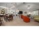 Open-concept living area showcasing tile floors, living, dining, and Gathering room with lots of natural light at 35350 County Road 439, Eustis, FL 32726