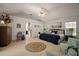 A spacious main bedroom with en suite bathroom featuring wood flooring, accent furniture and neutral decor at 35350 County Road 439, Eustis, FL 32726