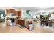 Spacious kitchen with stainless steel appliances, granite counters, and open layout to living spaces at 356 Giovani Blvd, Clermont, FL 34715