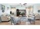 Cozy living room with plush seating, stylish decor, and plenty of natural light at 356 Giovani Blvd, Clermont, FL 34715