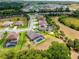 A high vantage point of the home in a residential neighborhood with screened pool at 3733 Statham Dr, Apopka, FL 32712