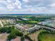 Aerial shot showcases this home's neighborhood, the green space, and proximity to other community features at 3733 Statham Dr, Apopka, FL 32712