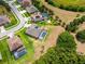 A birds eye view of the home and neighborhood including screened in pool and acreage at 3733 Statham Dr, Apopka, FL 32712