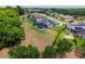 A large property featuring a residence with a screened pool, lawn, and mature trees at 3733 Statham Dr, Apopka, FL 32712