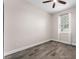Cozy bedroom featuring a window with blinds for natural light at 3733 Statham Dr, Apopka, FL 32712