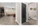 Open floor plan with tiled floors leading from hallway to the living room at 3733 Statham Dr, Apopka, FL 32712