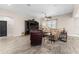 Comfortable living room features a large TV, shelving and an open floor plan at 3733 Statham Dr, Apopka, FL 32712