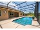 Relaxing screened-in swimming pool with a covered lanai, perfect for outdoor entertaining at 3733 Statham Dr, Apopka, FL 32712