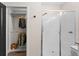 Bright bathroom featuring walk-in closet adjacent to glass enclosed shower at 3733 Statham Dr, Apopka, FL 32712