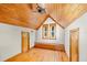 Charming attic space with wooden floors, wood ceilings, and built-in seating at 421 W 10Th Ave, Mount Dora, FL 32757