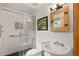 Modern bathroom with glass-enclosed shower, vanity, and stylish fixtures at 421 W 10Th Ave, Mount Dora, FL 32757