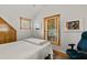 Cozy bedroom with wood trim, natural light, and a soothing color palette at 421 W 10Th Ave, Mount Dora, FL 32757