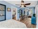 Bedroom featuring wood floors, ceiling fan, and built in closet at 43411 State Road 19, Altoona, FL 32702