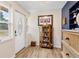 Bright entryway with wood floors and elegant decor at 43411 State Road 19, Altoona, FL 32702