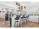 Spacious kitchen featuring a breakfast bar with seating and stainless steel appliances at 43411 State Road 19, Altoona, FL 32702