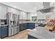 Charming kitchen featuring updated cabinetry, stainless steel appliances, and stone countertops at 43411 State Road 19, Altoona, FL 32702