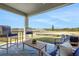 Outdoor patio with stylish furniture and a lovely view at 5463 Nickerbean St, Apopka, FL 32712