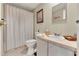 Clean bathroom with a vanity, toilet, and shower with a curtain at 741 Royal Palm Ave, Lady Lake, FL 32159