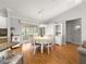 Light and bright dining room with hardwood floors and modern decor at 8069 Se 174Th Ludlow Pl, The Villages, FL 32162