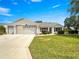 A lovely home with three-car garage and colorful window boxes at 8069 Se 174Th Ludlow Pl, The Villages, FL 32162