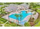 Birds eye view of the zero entry community pool featuring lap lanes and several seating areas at 8167 Bridgeport Bay Cir, Mount Dora, FL 32757
