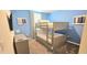 Charming bedroom featuring a cozy bunk bed, soft carpet, and stylish decor, creating a comfortable space at 817 Ocean Course Ave # 502, Davenport, FL 33896