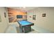 Entertaining game room showcasing a pool table, motorcycle decor, and vibrant design at 817 Ocean Course Ave # 502, Davenport, FL 33896