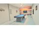 Fun game room featuring a pool table, Route 66 decor, and a chill ambiance at 817 Ocean Course Ave # 502, Davenport, FL 33896
