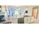 Well-equipped kitchen with stainless steel appliances and a breakfast bar at 817 Ocean Course Ave # 502, Davenport, FL 33896