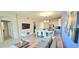 Open concept living area includes a kitchen, living room, and dining room at 817 Ocean Course Ave # 502, Davenport, FL 33896