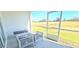 Enjoy outdoor seating and views of the golf course on this beautiful screened in lanai at 817 Ocean Course Ave # 502, Davenport, FL 33896