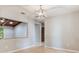 Inviting living area with a neutral palette, seamlessly connecting to other spaces, and featuring light, airy flooring at 8410 Lake Bosse Dr, Orlando, FL 32810