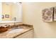 Bathroom featuring granite countertops and a decorative framed mirror at 866 Ashworth Overlook Dr # B, Apopka, FL 32712