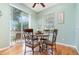 Charming dining area with hardwood floors and sliding glass doors at 866 Ashworth Overlook Dr # B, Apopka, FL 32712
