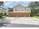 Three-story townhome features a private balcony and three car garage at 866 Ashworth Overlook Dr # B, Apopka, FL 32712