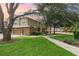 Charming townhome featuring a two-car garage, lush lawn, and inviting landscaping at 866 Ashworth Overlook Dr # B, Apopka, FL 32712