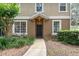 Welcoming front entrance with lush landscaping leading to the front door at 866 Ashworth Overlook Dr # B, Apopka, FL 32712