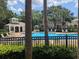The community pool area includes seating, shade and restroom at 866 Ashworth Overlook Dr # B, Apopka, FL 32712