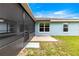 Exterior view featuring a screened-in patio perfect for enjoying the outdoors in comfort and style at 8869 Se 159Th Pl, Summerfield, FL 34491