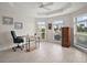 Office with tray ceiling, tile floors, lots of natural light and work space at 892 Hubbard Loop, The Villages, FL 32163
