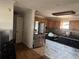 Kitchen with wood cabinets and stainless steel appliances at 916 Kentucky St, Haines City, FL 33844