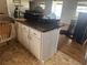 Spacious kitchen island with granite countertops at 916 Kentucky St, Haines City, FL 33844